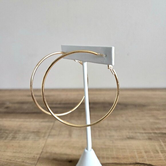 Large gold tone metal loops earrings. - Picture 2 of 3